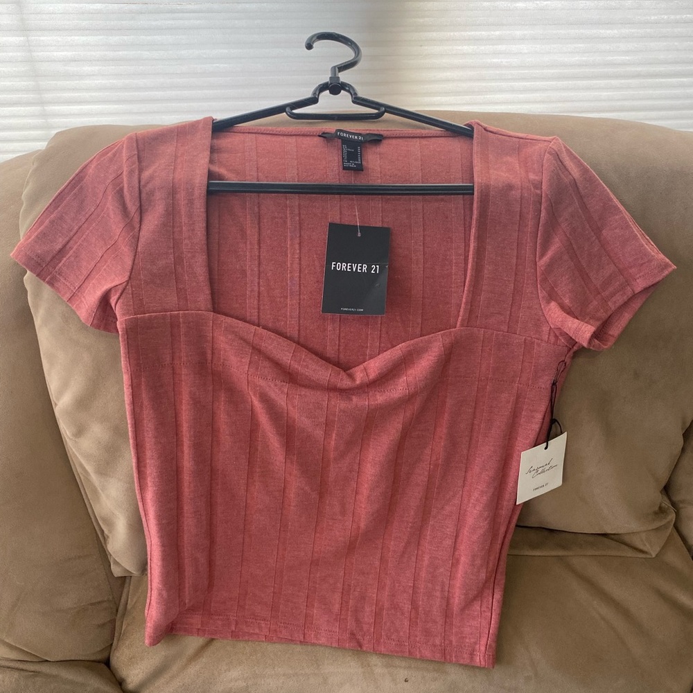 Flattering rose-color portrait-neck top with short sleeves